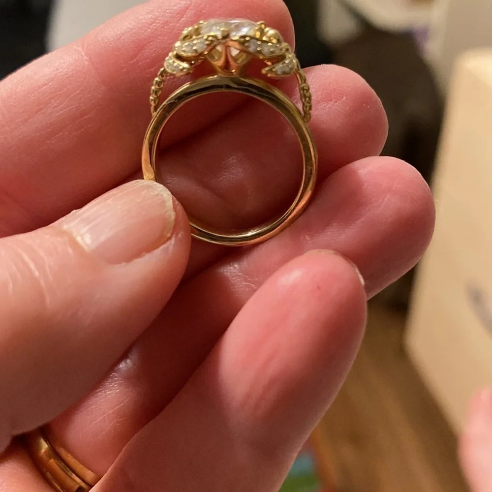 10kt yellow gold and moissanite dragonfly ring.
